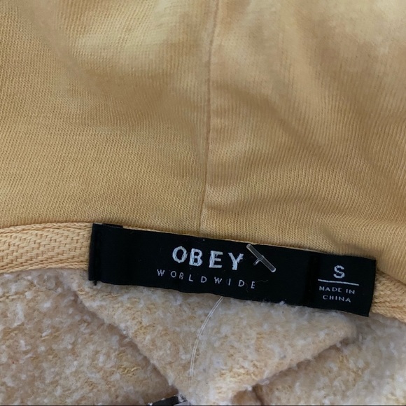 OBEY Yellow Hoodie with Black Rose Graphic Detailing on Sleeves Size Small - Picture 7 of 7